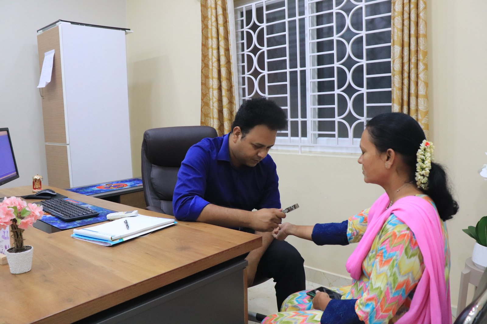 Doctor analyzing skin condition with dermatoscope
